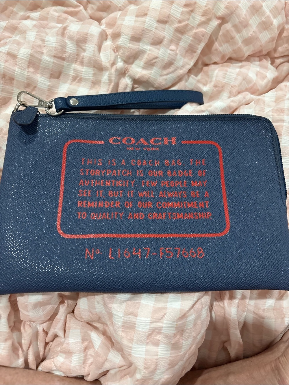 Coach Navy Wristlet with Red Logo Print